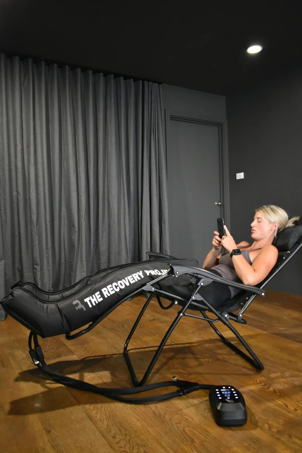Member relaxing in the compression therapy recovery chair